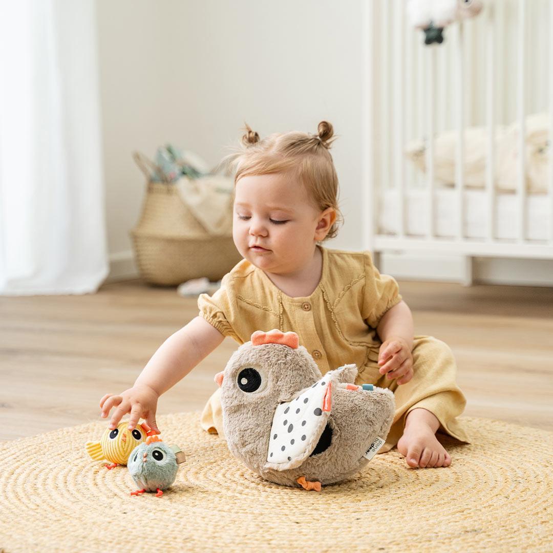 Done by Deer Hide and Seek Activity Toy Clucky - Beige